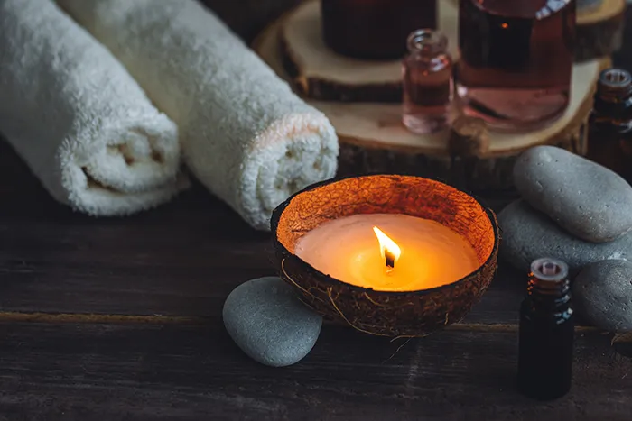 candle and towels for massage and relaxation